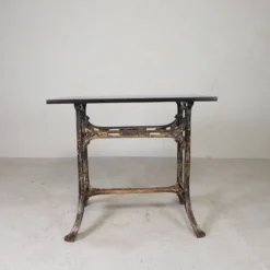 Industrial table, garden table with hard stone slab on cast iron frame, 1930s