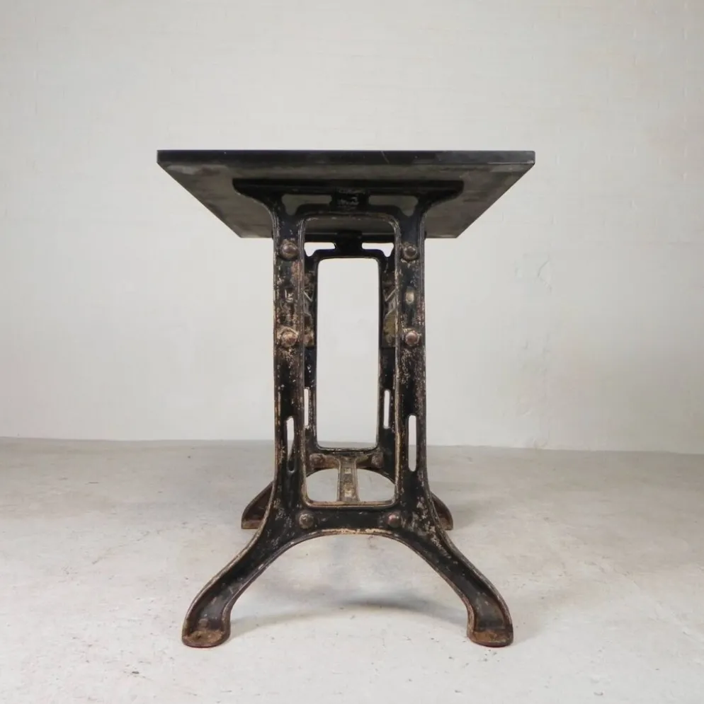 Industrial table, garden table with hard stone slab on cast iron frame, 1930s