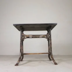 Industrial table, garden table with hard stone slab on cast iron frame, 1930s