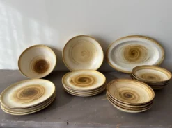 Lot de 4 assiettes creuses signées Longchamp