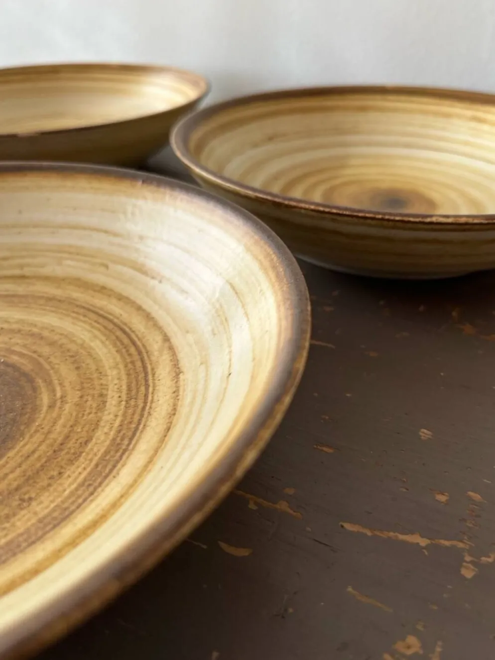 Lot de 4 assiettes creuses signées Longchamp