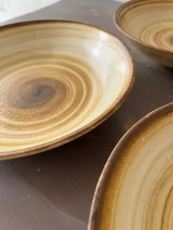 Lot de 4 assiettes creuses signées Longchamp