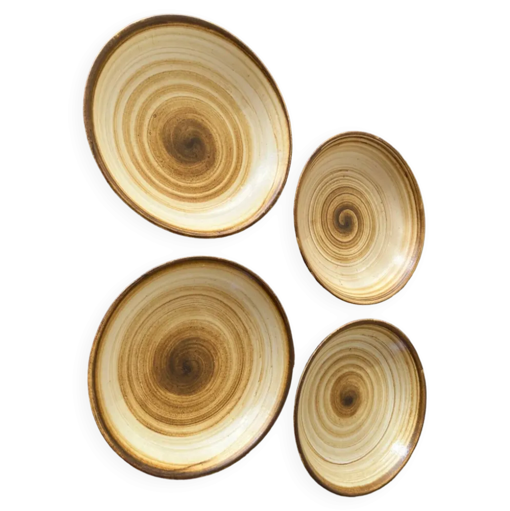 Lot de 4 assiettes creuses signées Longchamp