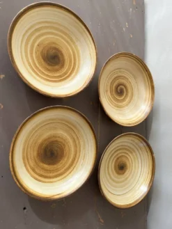 Lot de 4 assiettes creuses signées Longchamp