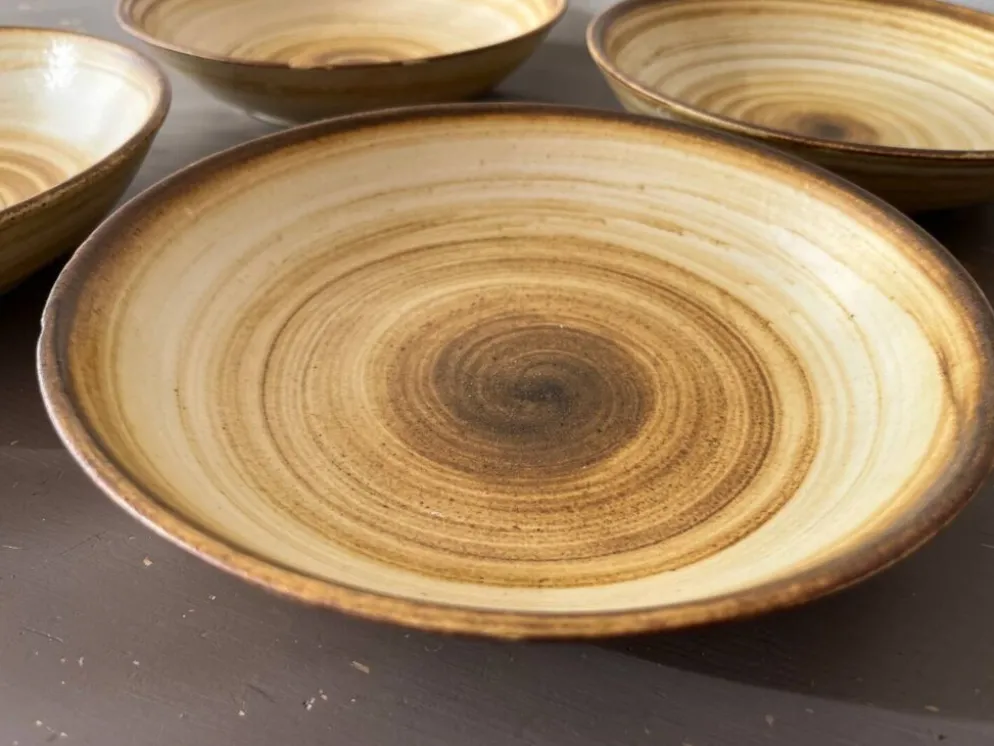 Lot de 4 assiettes creuses signées Longchamp