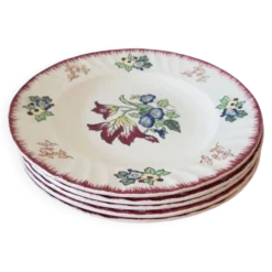 Lot de 5 assiettes plates, signé Longwy