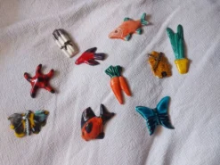 Lot de 10 céramiques animaux , poissons , papillon
