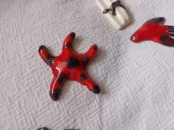 Lot de 10 céramiques animaux , poissons , papillon