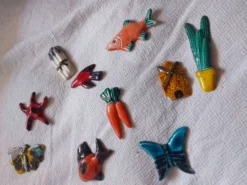 Lot de 10 céramiques animaux , poissons , papillon