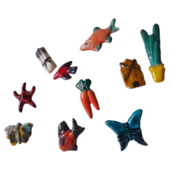 Lot de 10 céramiques animaux , poissons , papillon