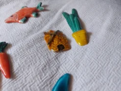 Lot de 10 céramiques animaux , poissons , papillon