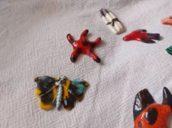 Lot de 10 céramiques animaux , poissons , papillon