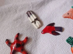 Lot de 10 céramiques animaux , poissons , papillon