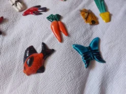 Lot de 10 céramiques animaux , poissons , papillon