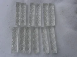 Lot de douze porte couteaux en cristal dans leur boite