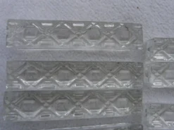 Lot de douze porte couteaux en cristal dans leur boite
