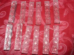 Lot de douze porte couteaux en cristal dans leur boite