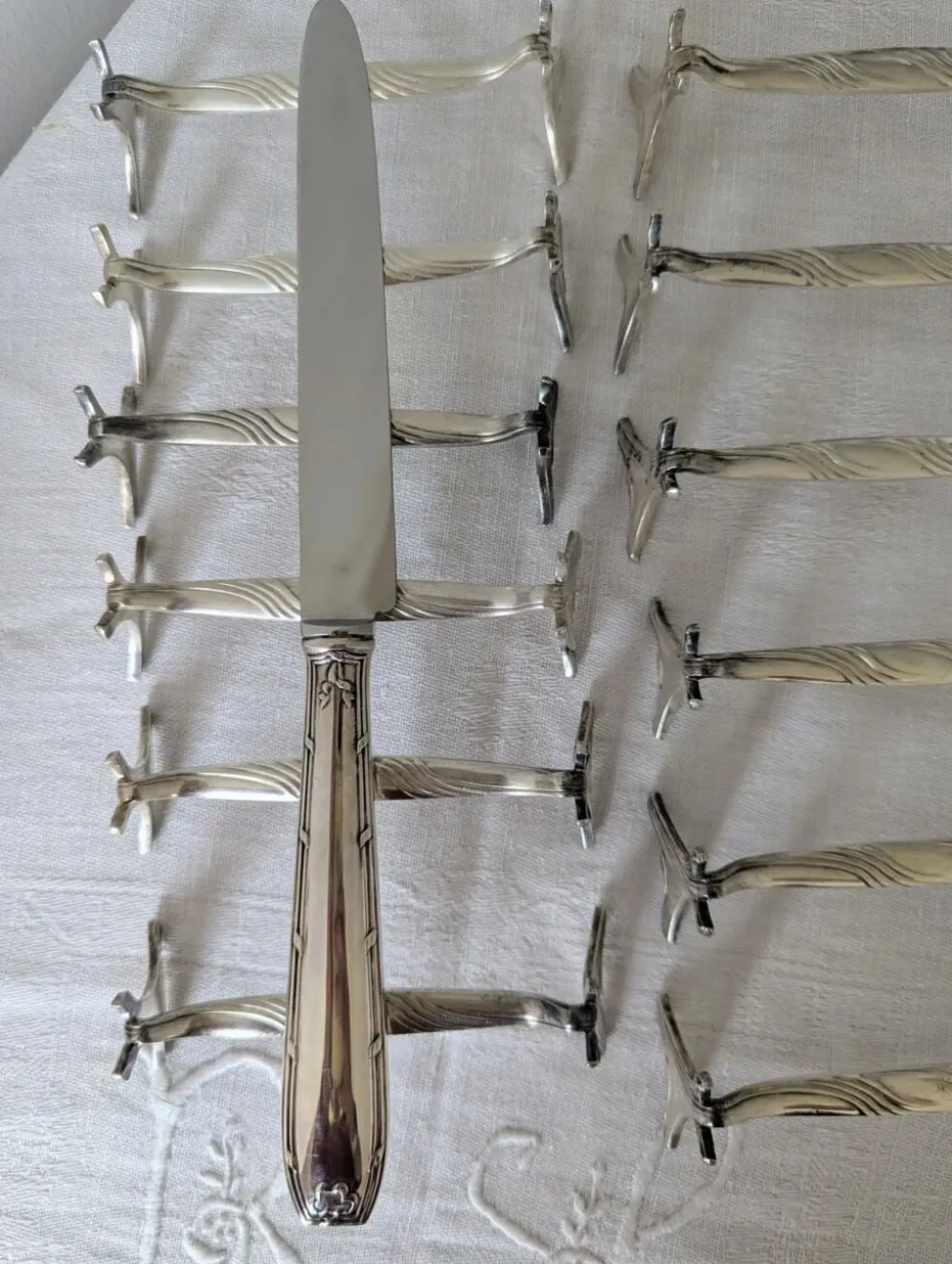 Lot de 12 porte-couteaux Christofle modèle Moderne 1912