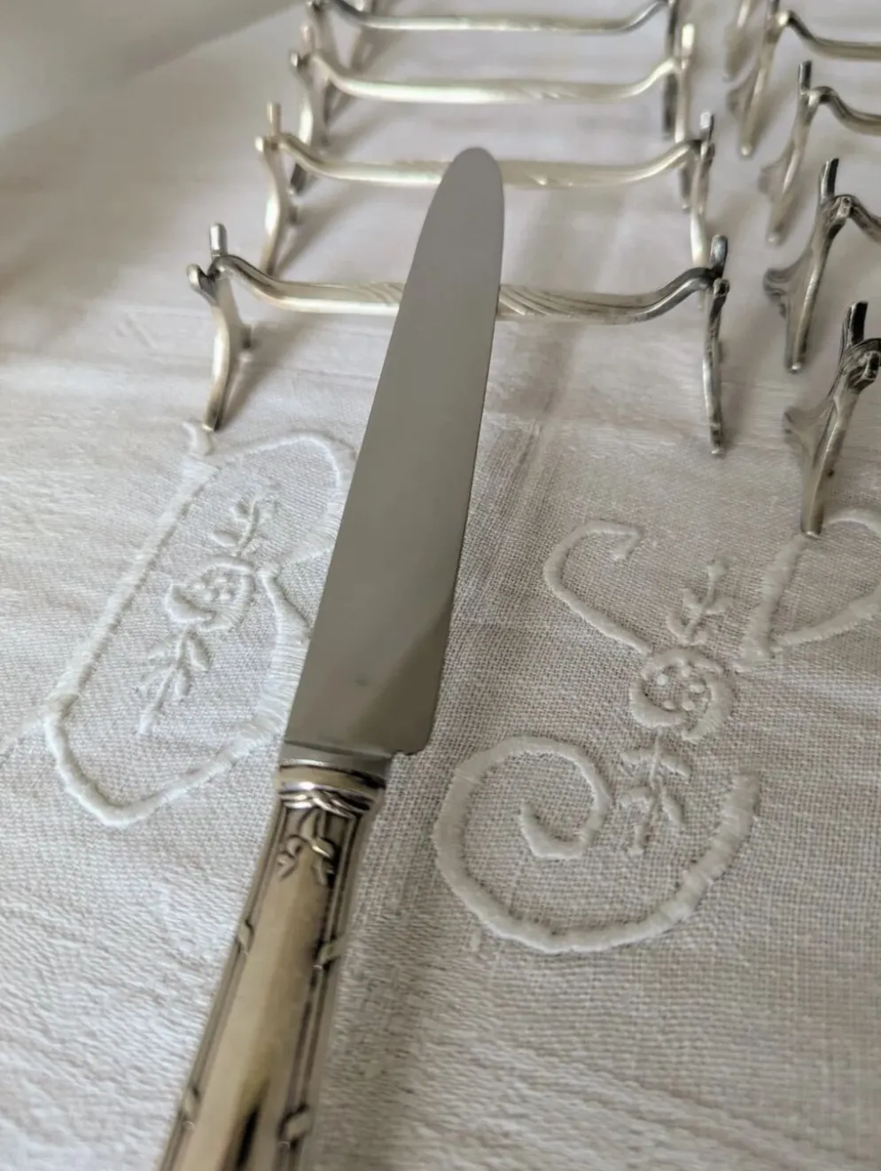 Lot de 12 porte-couteaux Christofle modèle Moderne 1912