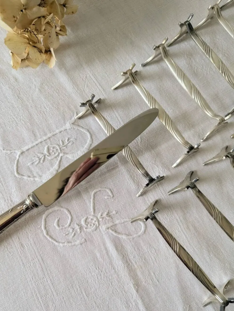 Lot de 12 porte-couteaux Christofle modèle Moderne 1912