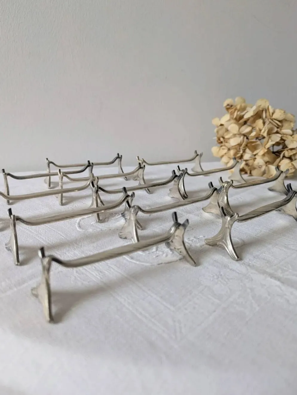 Lot de 12 porte-couteaux Christofle modèle Moderne 1912
