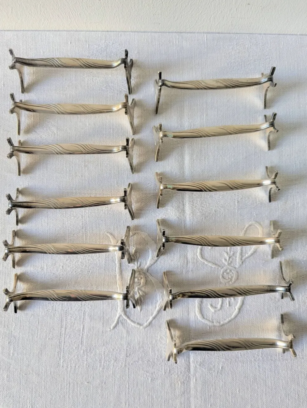 Lot de 12 porte-couteaux Christofle modèle Moderne 1912