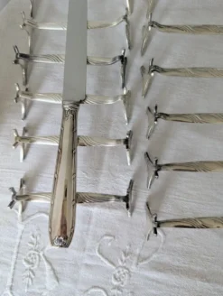Lot de 12 porte-couteaux Christofle modèle Moderne 1912