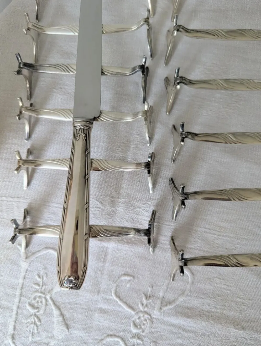 Lot de 12 porte-couteaux Christofle modèle Moderne 1912