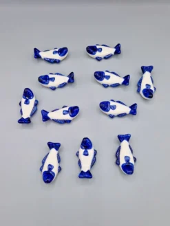 Lot de 11 porte couteaux poissons en porcelaine bleu blanc vintage