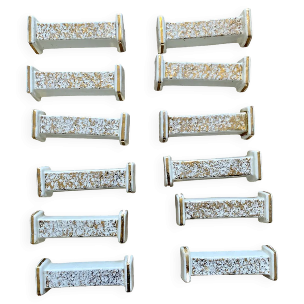 Lot de 10 porte-couteaux vintage art déco en céramique blanche et dorée
