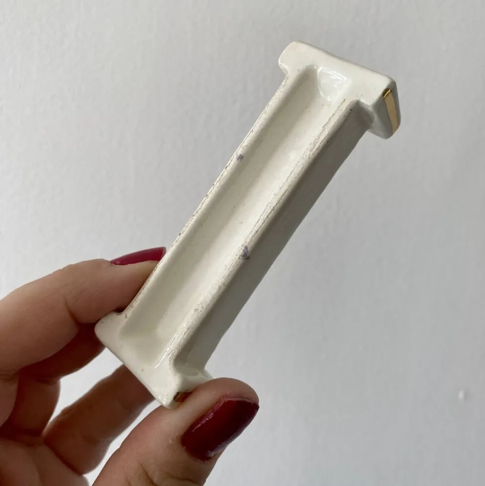 Lot de 10 porte-couteaux vintage art déco en céramique blanche et dorée