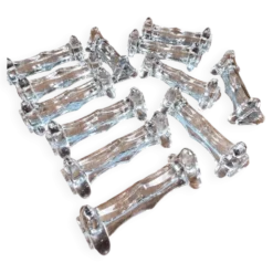 Lot de 12 repose-couteaux et fourchettes anciens en verre épais transparent