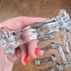 Lot de 12 repose-couteaux et fourchettes anciens en verre épais transparent