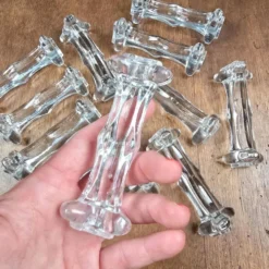 Lot de 12 repose-couteaux et fourchettes anciens en verre épais transparent