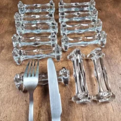 Lot de 12 repose-couteaux et fourchettes anciens en verre épais transparent