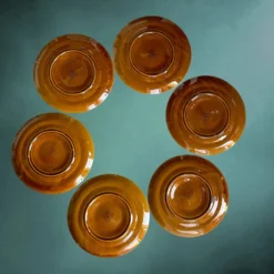 Lot de six assiettes à huîtres Niderviller en faïence émaillée caramel – années 60