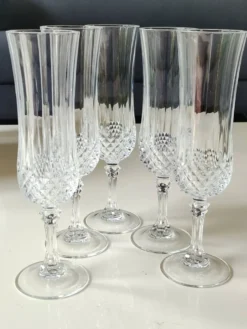 Lot 5 Flûtes Champagne/Cristal d Arques/Mod. Longchamp. Pointes diamant