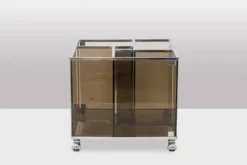 Maison Jansen. Meuble pour vinyles en verre fumé. Années 1970.