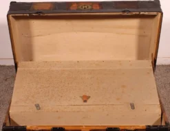 malle de voyage du début du 20° siècle en cuir et bois