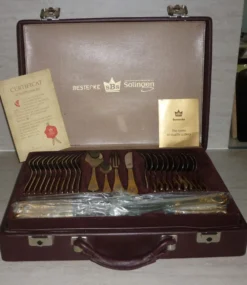 Mallette ménagère 70 pièces Besteke SBS Solingen en chrome nickel et dorée à l’or