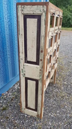 Meuble de marchand - chiffonnier 12 tiroirs en teck