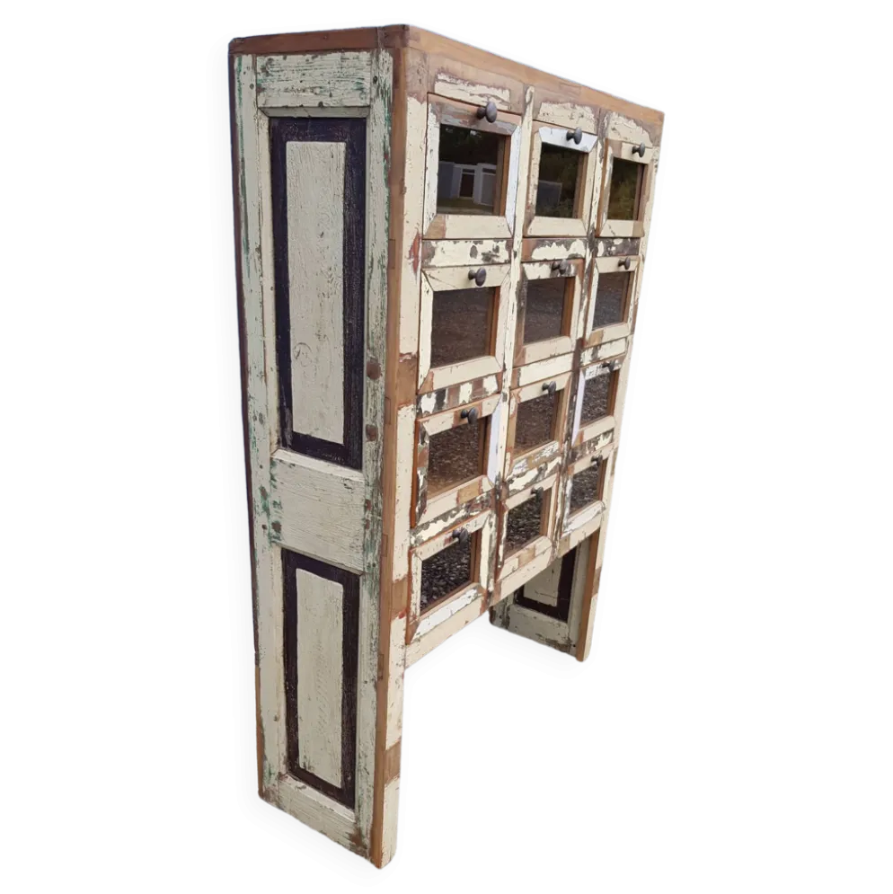 Meuble de marchand - chiffonnier 12 tiroirs en teck