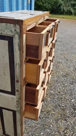 Meuble de marchand - chiffonnier 12 tiroirs en teck