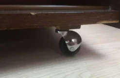 Meuble vintage bibliothèque, télé ou chaîne hifi roulettes porte glissante