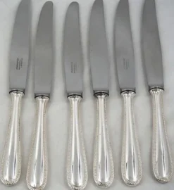 Ménagère 25 pièces François Frionnet en métal argenté, décor perles