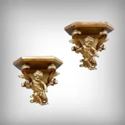 Paire de consoles d’applique en bois doré – fin XIXe