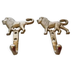 Paire de patères lions argentées