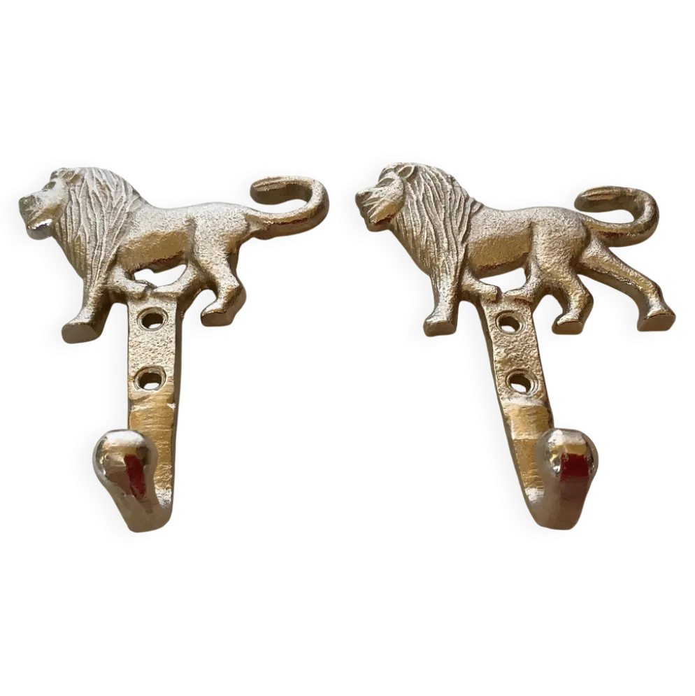 Paire de patères lions argentées