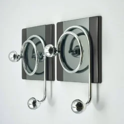 Paire de patères Space Age italiennes avec miroir Goffredo Reggiani des années.