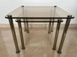 Paire de 2 tables gigognes massives en chrome et verre fumé / vers les années 1980.